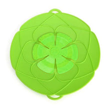 The Silicone Spill Stopper Lid showcasing its universal fit on a pan.