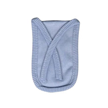 Close-up of the natural cotton fabric texture of the reusable tap filter.