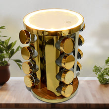 Side view of the golden LED rotating spice rack filled with seasoning jars.