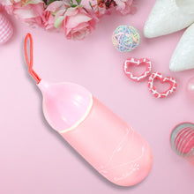 Front view of the unique shape plastic water bottle with a convenient carrying dori.