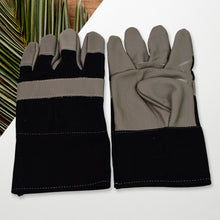 Durable leather gardening gloves, ideal for heavy-duty tasks, shown on a clean background.