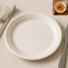 30 cm round dinner plate with glossy white finish on table