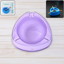 Transparent purple plastic ashtray with wide bowl and triangular shape