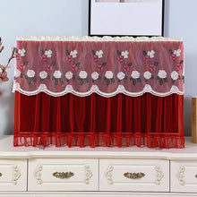 A neatly installed dustproof TV cover on a modern television set.