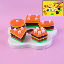 Colorful geometric stacking sorter toy featuring various shapes for toddler shape learning