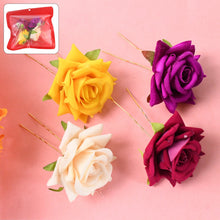 Multicolor flower hair pin showing vibrant rose design on dark hair
