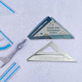 A BoltForce 45-degree triangle ruler with clear measurement markings on a workbench.