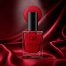 Vibrant red matte nail polish bottle with a smooth finish.
