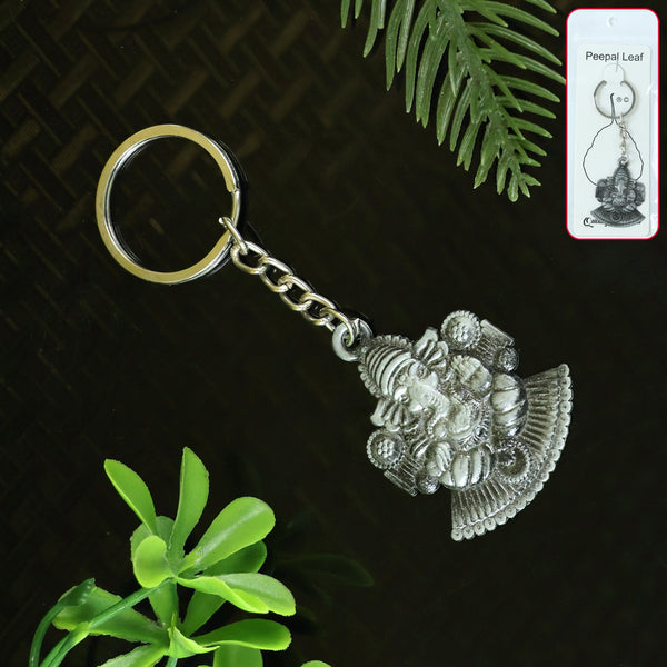 Lord Ganesha keychain with silver metal finish, front view