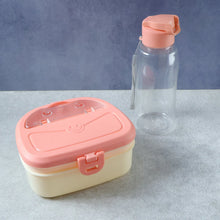 Side angle view of plastic lunch box set with water bottle