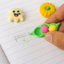 A fun white ghost-shaped cartoon eraser, ideal for kids' school bags and art supplies.