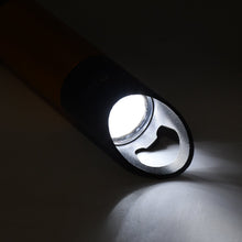 Mini LED torch illuminating a dark space, demonstrating its high lumen output.