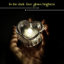 Crystal style LED tealight candle set emitting warm white flicker