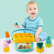 An overhead shot showing different colored geometric shapes of the stacking toy.