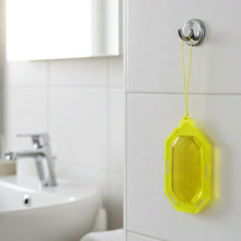 Close-up of citrus gel air freshener showing the gel texture