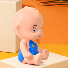 The colourful milk bottle rubber bath toy included in the Aditi squeeze toy set.
