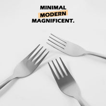 Stainless steel dinner forks featuring ergonomic handles for comfortable grip.