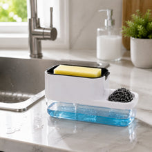 Hand pressing pump of dish soap dispenser releasing liquid soap