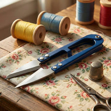 Sewing scissors cutting fabric smoothly during crafting projects