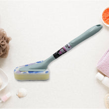 The versatile triangular cleaning brush resting on a bathroom counter.