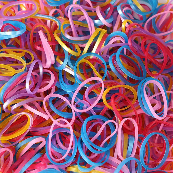 Multicolor elastic rubber bands neatly organized for office and home use.