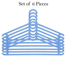 Detailed view of the hook on a plastic clothes hanger, designed for stability.
