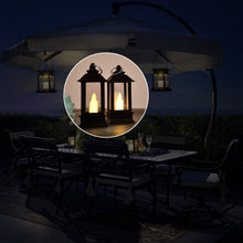 An outdoor dining area at night with lanterns hanging from an umbrella, featuring a close-up inset of two black lanterns.