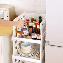 The foldable storage solution shown in a bedroom closet, neatly organizing clothes.