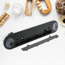 The back of the white LED vanity light shows the battery compartment, suction cups, and a black on/off switch.