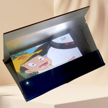 Compact phone screen magnifier stand, ideal for hands-free viewing.