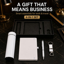 White 4-in-1 office set displayed outside its black box on a dark marble surface with office decor.