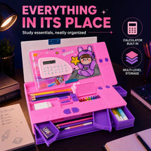Open pink space-themed pencil box with calculator, filled with stationery, on a desk with books and a lamp.