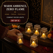 A hand placing a clear plastic lantern with a glowing LED candle on a dark surface with other lanterns and decor.