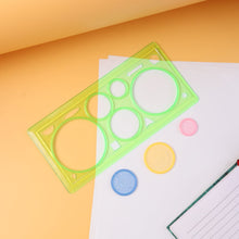 Spirograph geometry design ruler with circular tracks and stencil shapes