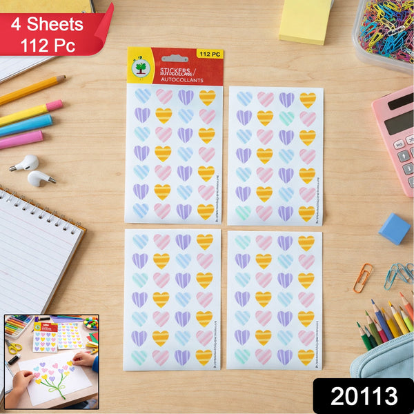 Four sheets of heart stickers displayed on a wooden desk with various office and art supplies.