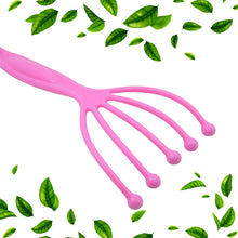 Person gently using the handheld scalp massager on their head for relaxation.