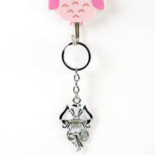 Detailed metal key ring featuring Trishul symbol on keychain