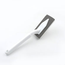 Multi-surface triangle cleaning tool for various household chores.