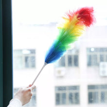 Ergonomic handle of a colourful microfiber cleaning duster.