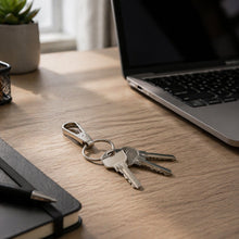 Assorted metal keychain clips for keys, bags, and belts