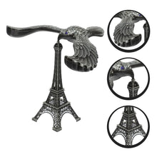 Front view of the balancing eagle toy and Eiffel Tower base, ready to adorn any desk or shelf.