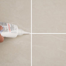 Freshly sealed tiled floor showing clean grout lines after application of the gap filler.