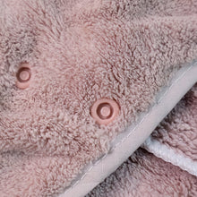 Microfiber hair towel wrap being worn comfortably during makeup application