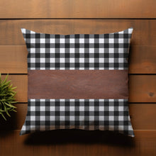 Detailed view of the rich texture and stitching on the decorative leather pillow cover.