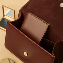 Tri-fold PU leather wallet opened showing card slots and currency compartments