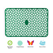 Close-up of durable PVC mats inside a fridge drawer.