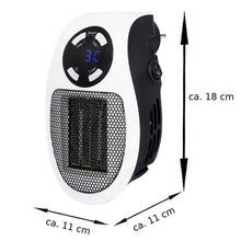 Energy-saving desktop heater plugged directly into a wall socket with its 360-degree rotating plug.