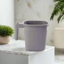 Four versatile square plastic mugs, suitable for various household uses.