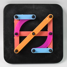 Brightly coloured alphabet numeric puzzle pieces arranged in a grid pattern.
