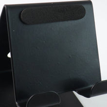 Front view of metal mobile and tablet stand showcasing compact and portable design